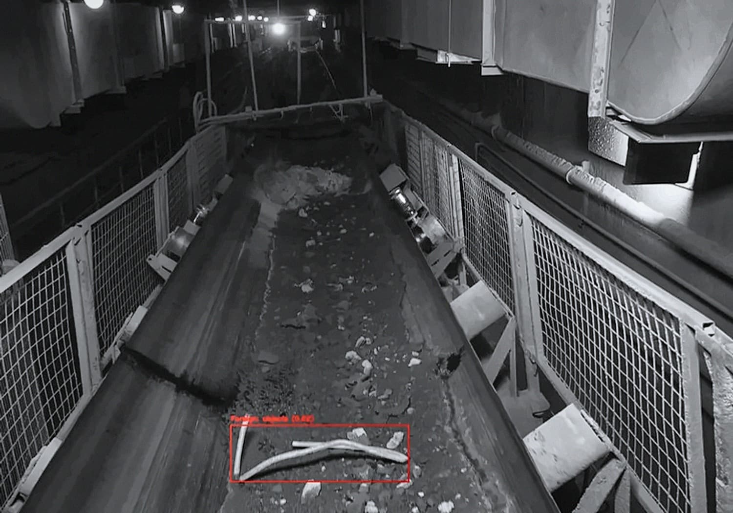 Vizibelt AI conveyor monitoring — camera view of a running belt with a foreign object detected